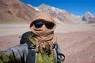 Yours truly, bundled against the wind, sand and sun